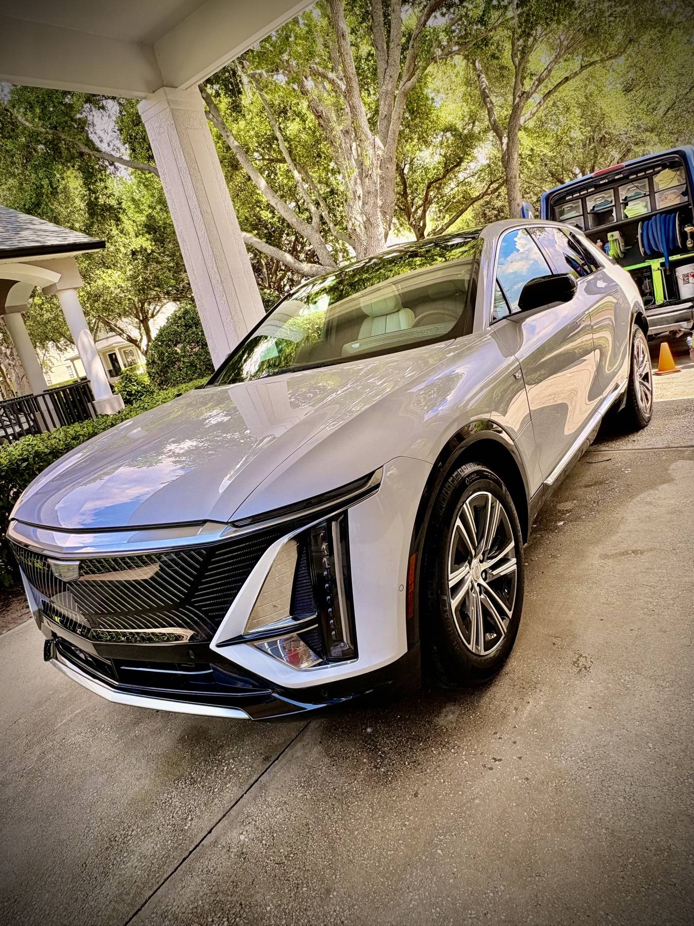 White Cadillac LYRIQ after a mobile detail