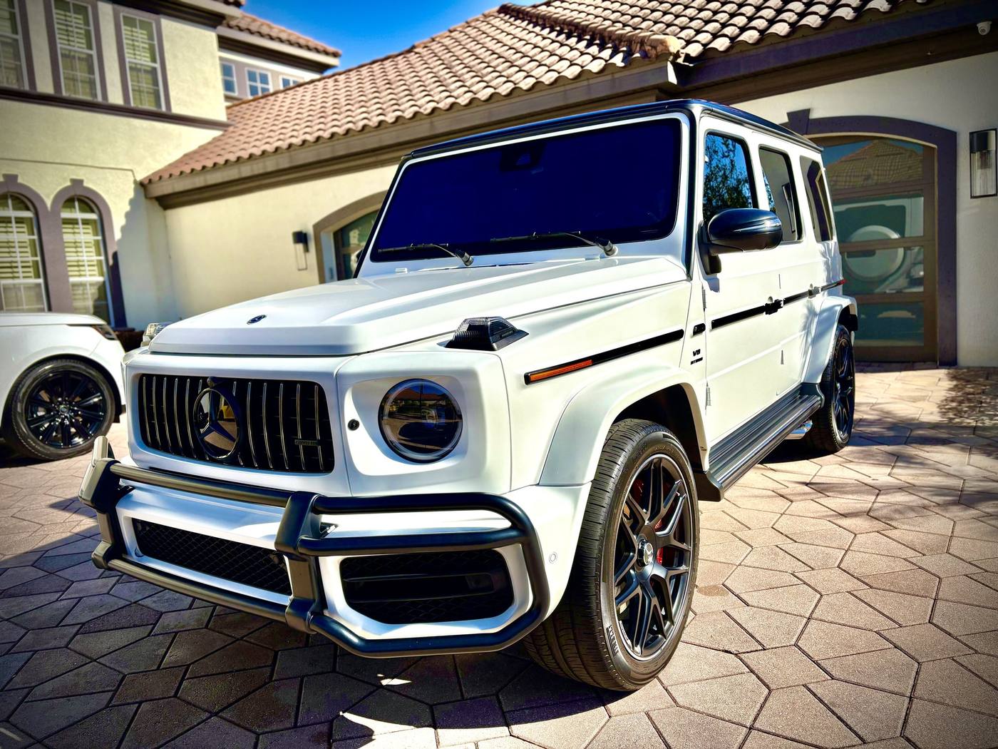White Mercedes G-Class after a driveway detail